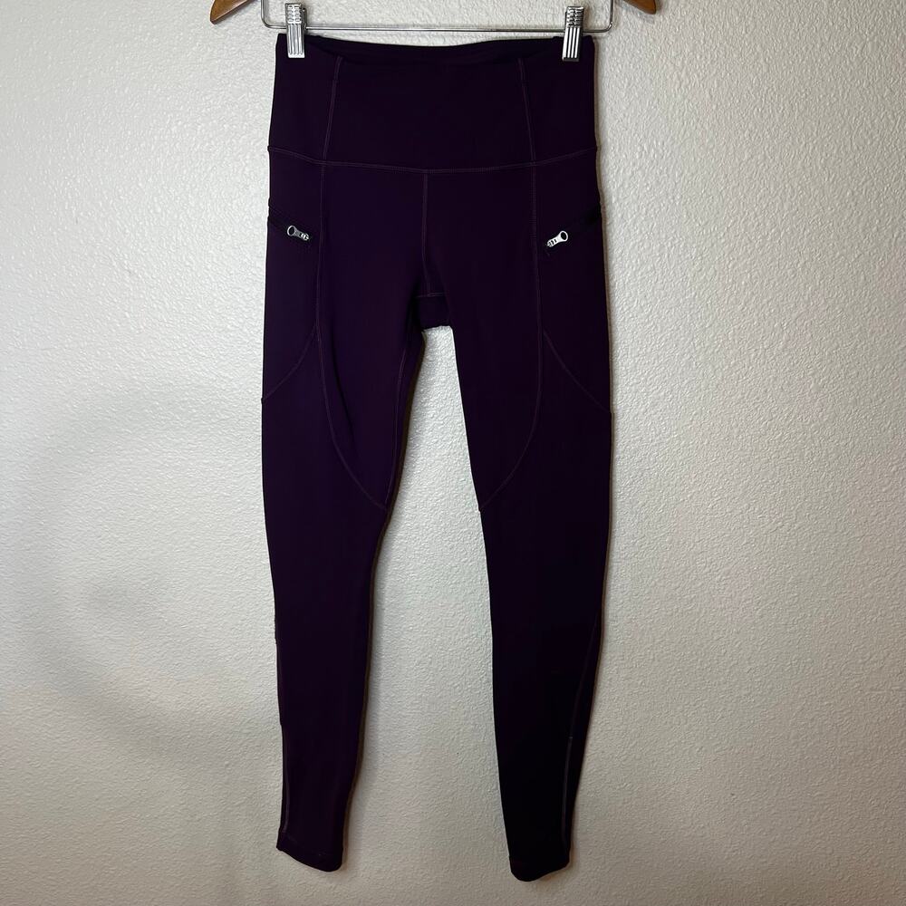 Lululemon purple fleece leggings with zipper thigh pockets WOMENS 6